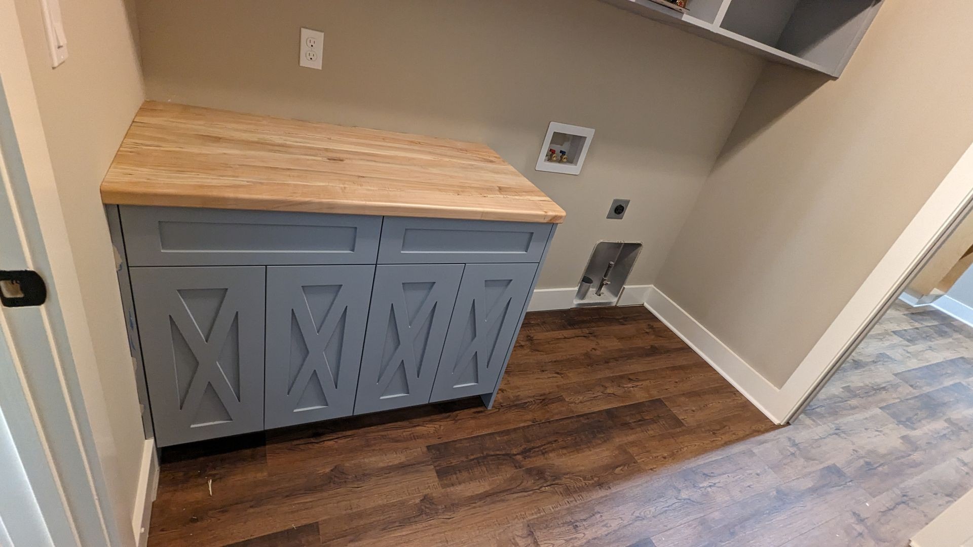 Custom handcrafted laundry room cabinets for organized and stylish home storage