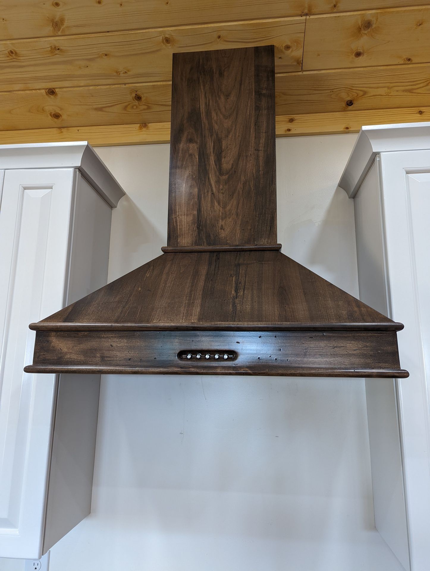 Custom range hoods designed for stylish and functional kitchen ventilation